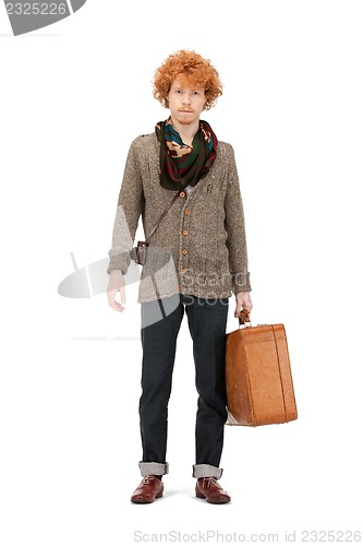 Image of man with suitcase