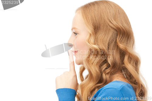 Image of finger on lips