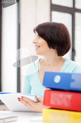 Image of woman with folders
