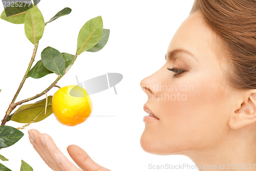 Image of lovely woman with lemon twig