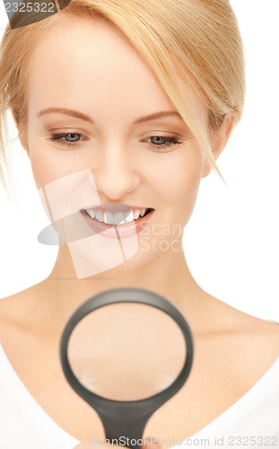 Image of woman with magnifying glass