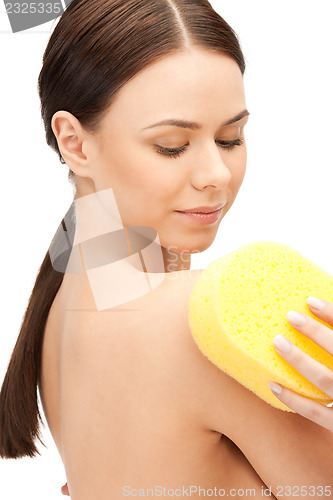 Image of beautiful woman with sponge