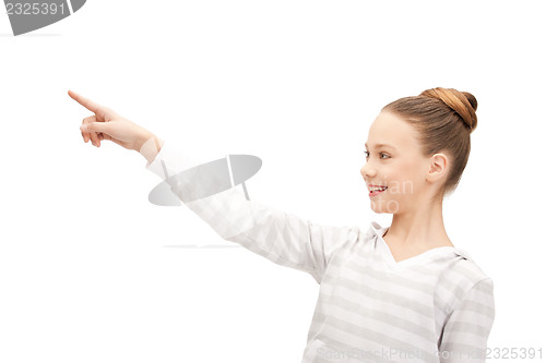 Image of teenage girl pointing her finger