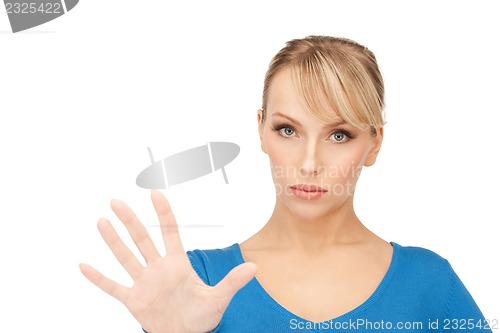 Image of woman making stop gesture