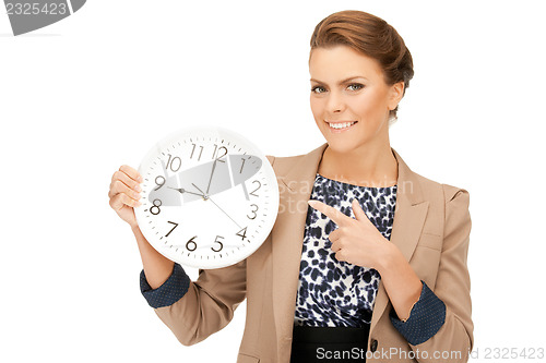 Image of woman holding big clock