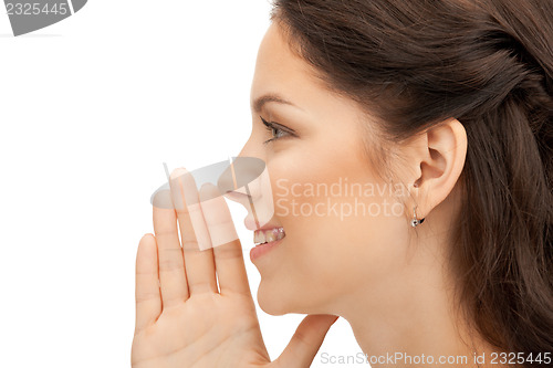 Image of woman whispering gossip