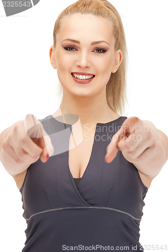 Image of lovely fitness instructor pointing her finger