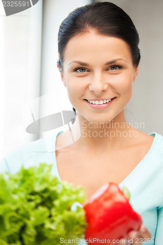 Image of beautiful woman in the kitchen