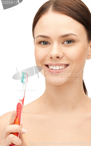 Image of beautiful woman with toothbrush