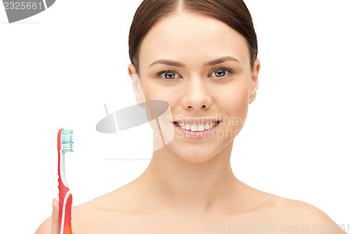 Image of beautiful woman with toothbrush