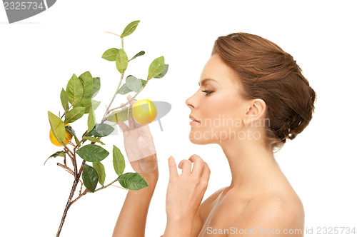 Image of lovely woman with lemon twig