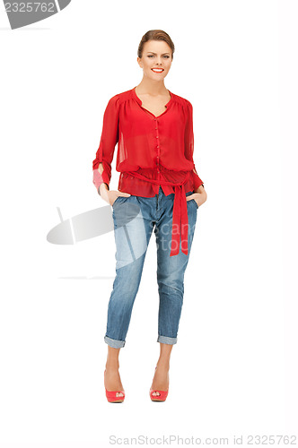 Image of lovely woman in red blouse and jeans