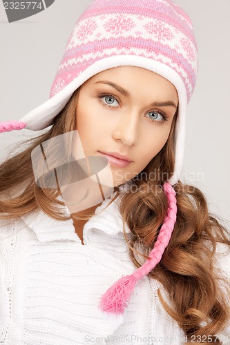 Image of beautiful woman in winter hat