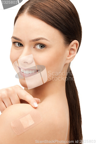 Image of beautiful woman with plaster