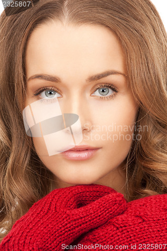 Image of beautiful woman in mittens