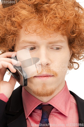 Image of handsome man with cell phone