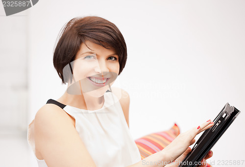 Image of happy woman with tablet pc computer
