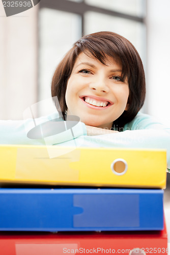 Image of woman with folders