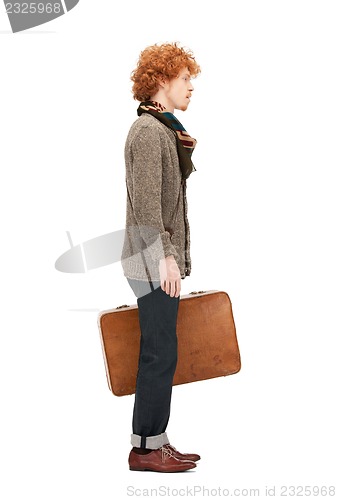 Image of man with suitcase