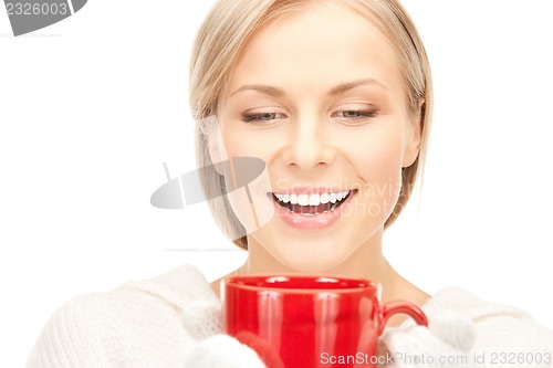 Image of woman with red mug