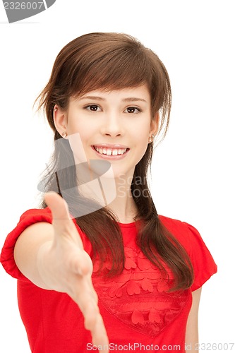 Image of teenage girl with an open hand ready for handshake