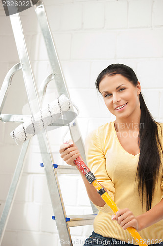 Image of lovely housewife painting