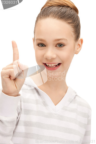 Image of teenage girl with her finger up