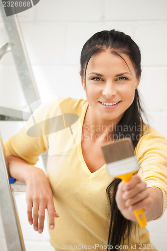 Image of lovely housewife painting