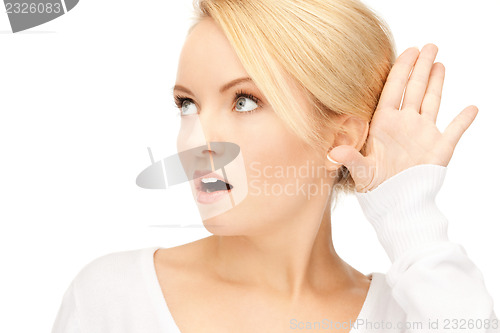 Image of woman listening gossip