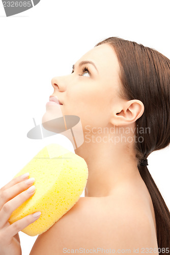 Image of beautiful woman with sponge