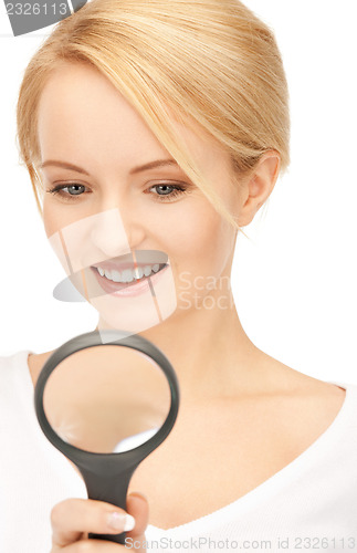 Image of woman with magnifying glass