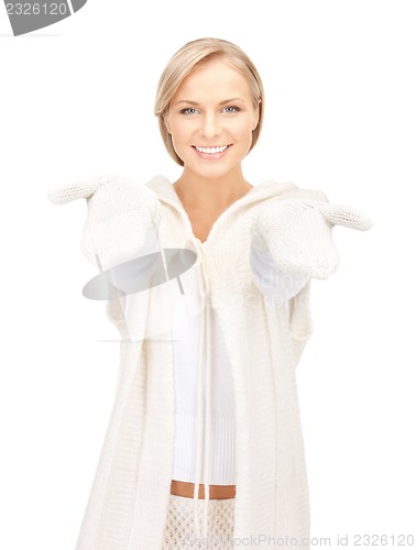 Image of beautiful woman in white sweater