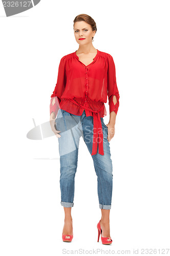 Image of lovely woman in red blouse and jeans