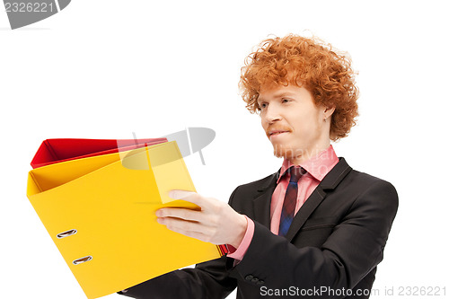 Image of man with folders