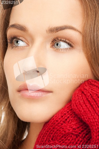 Image of beautiful woman in mittens