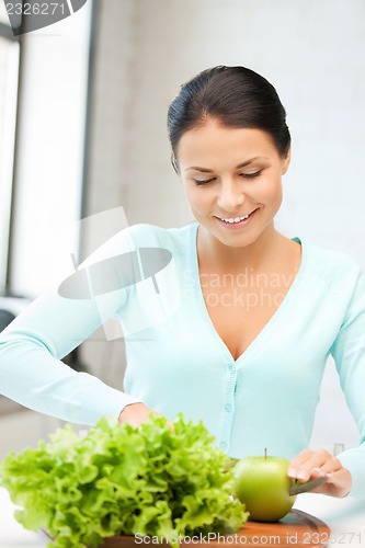 Image of beautiful woman in the kitchen