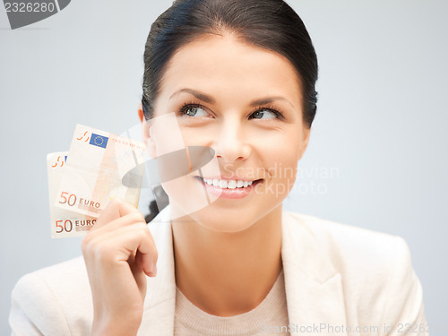 Image of lovely woman with euro cash money