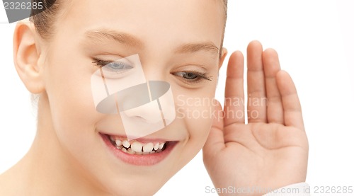 Image of teenage girl listening gossip