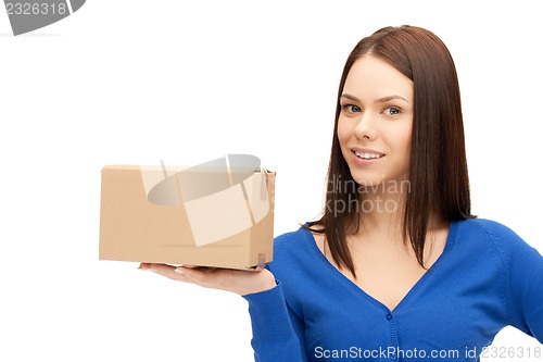 Image of attractive businesswoman with cardboard box