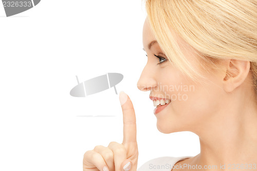 Image of finger on lips