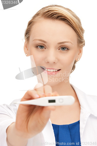 Image of attractive female doctor with thermometer