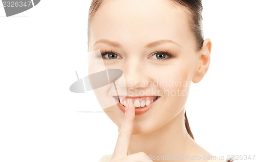 Image of finger on lips