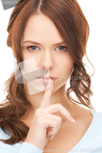 Image of finger on lips