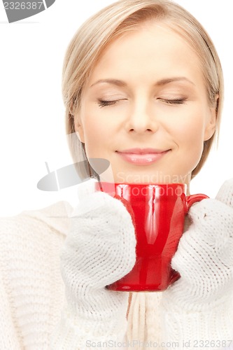 Image of woman with red mug