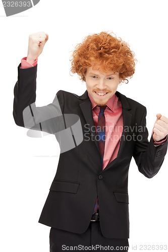 Image of handsome man with expression of tryumph