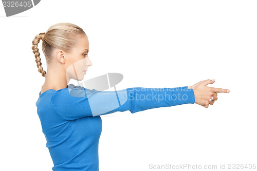 Image of businesswoman pointing her finger