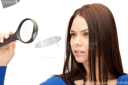 Image of woman with magnifying glass