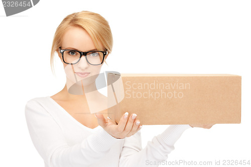 Image of attractive businesswoman with cardboard box