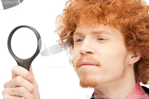 Image of man with magnifying glass