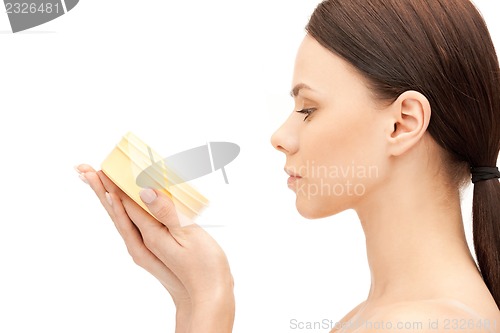 Image of beautiful woman with moisturizing creme